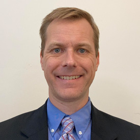 Headshot of Tim Wallace