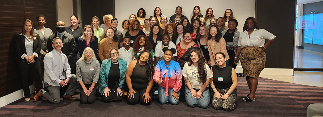 A group of several dozen members of the National Council on Youth Homelessness